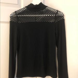 Black shirt with grid on the neck
